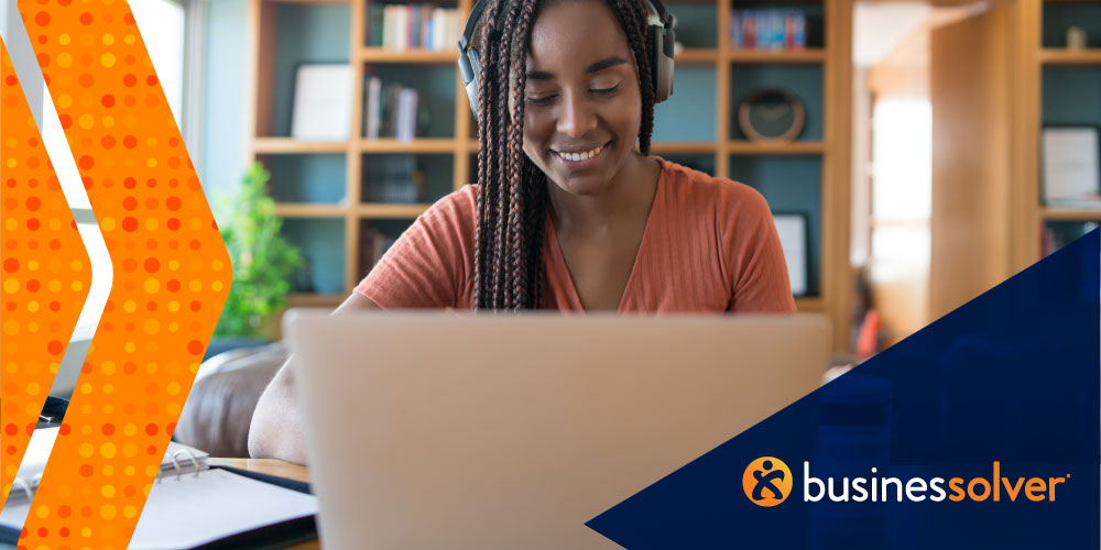 woman-with-headphones-and-computer