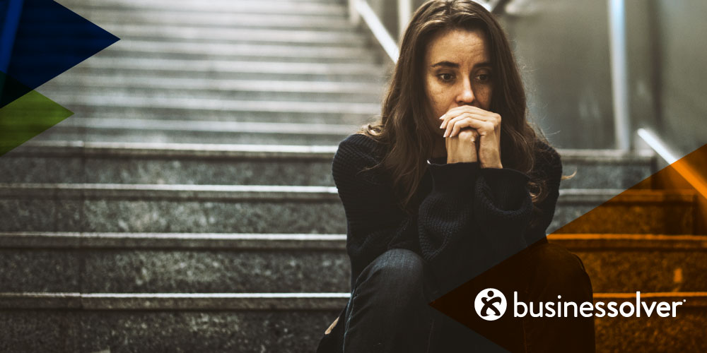 women-depressed-on-stairs